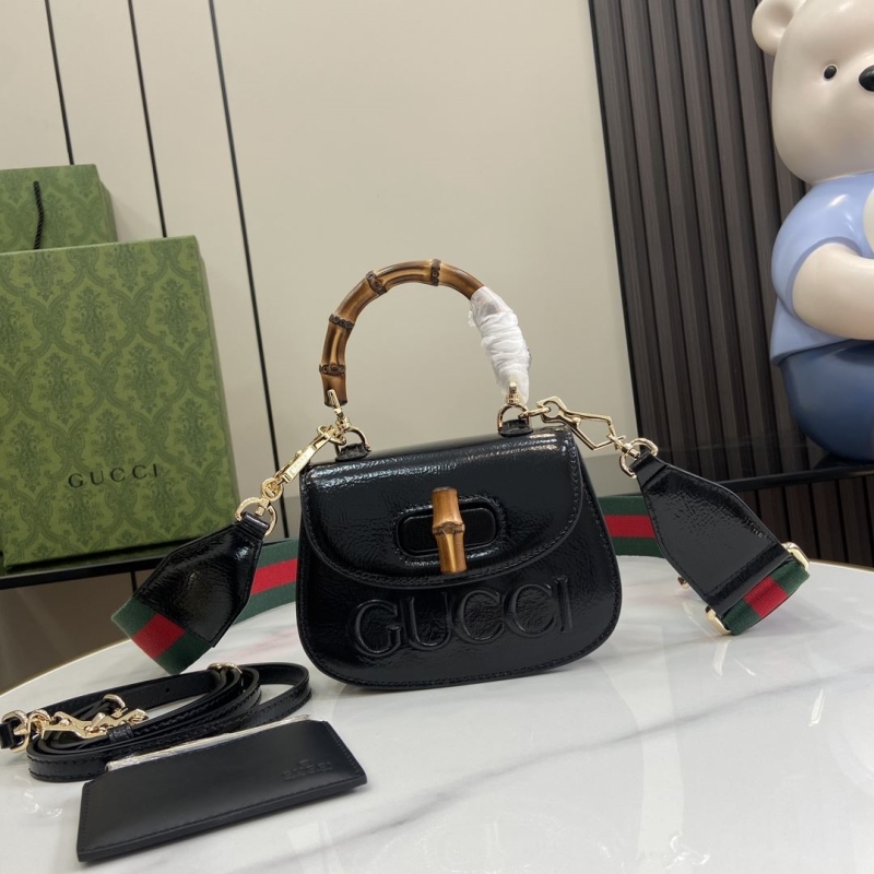 G*u*i top handle bags